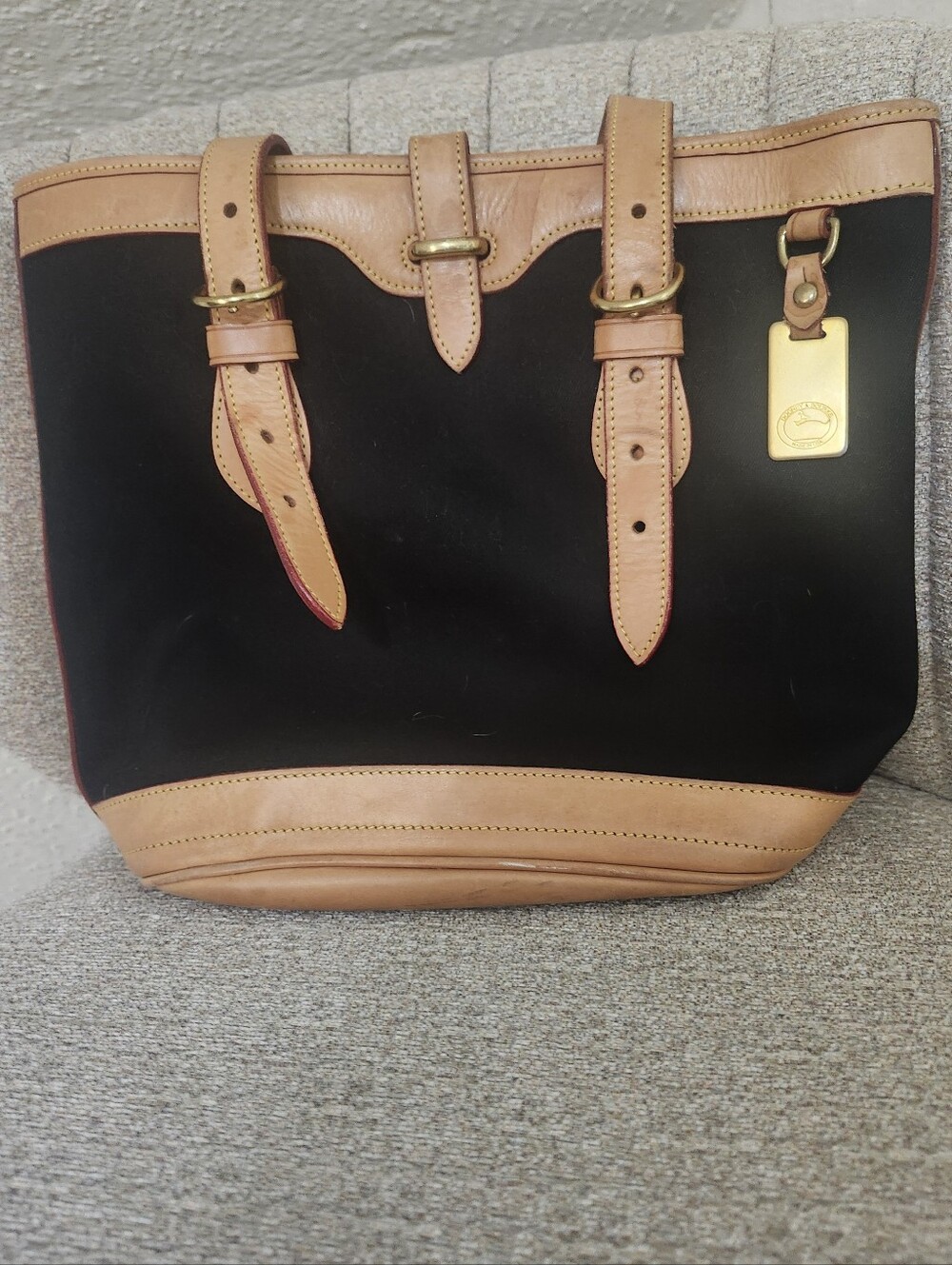 Dooney & Bourke Black Tote with Tan Leather Trim and Gold Tag